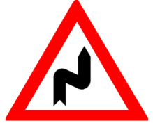 traffic sign right zigzag bend